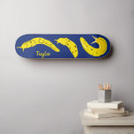 Banana Slugs Yellow and Royal Blue Personalised Skateboard<br><div class="desc">Create a personalised gift that's perfect for anyone who loves creepy crawly creatures. This skateboard features illustrations of banana slugs in a bright and cheery yellow set against a royal blue background. There's a spot to add a name in matching yellow lettering.</div>