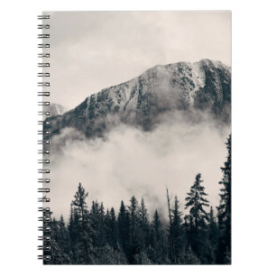 Banff national park foggy mountains and forest in  notebook