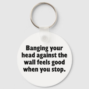 Banging your head against a brick wall key ring