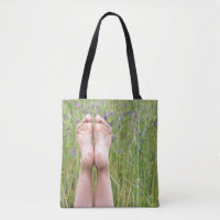 bare feet in meadow wildflowers
