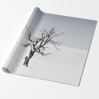 BARE TREE IN THE MIDDLE OF SNOW