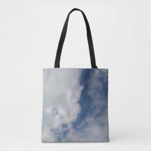 Barely see the sky, through the clouds tote bag