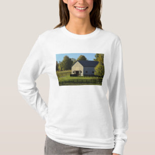 Barn on thoroughbred horse farm at sunrise, T-Shirt