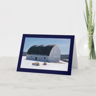 Barn with curved roof in snow card
