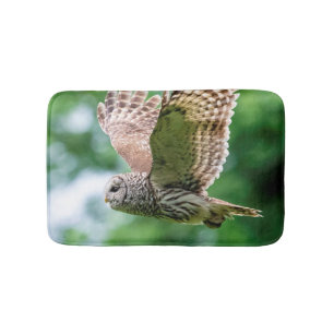 Barred Owl in flight Bath Mat