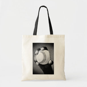 baseball in hand tote bag