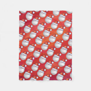 Baseball with Santa Hat on Red Fleece Blanket