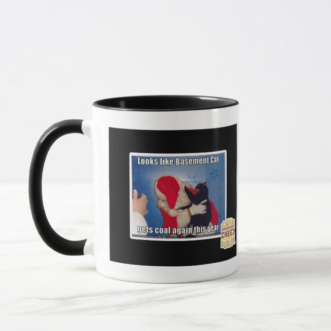 Basement Cat gets coal Mug (Left)