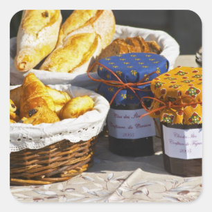 Basket with croissants and chocolate breads. square sticker