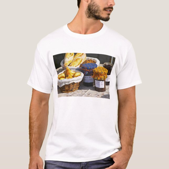 Basket with croissants and chocolate breads. T-Shirt (Front)