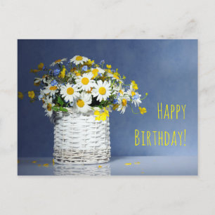 Basket with spring flowers postcard