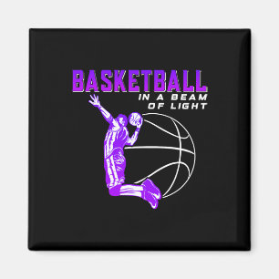 Basketball in a beam of light magnet