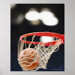 Basketball in basket. poster