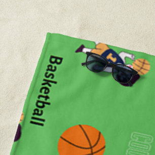 Basketball pattern on green beach towel