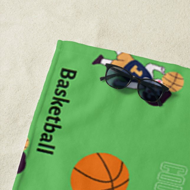 Basketball pattern on green beach towel (In Situ)