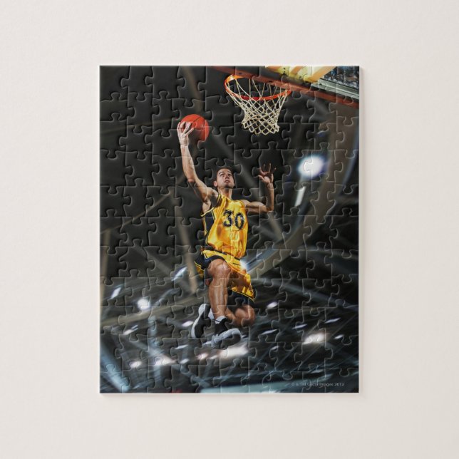 Basketball player  jumping in air jigsaw puzzle (Vertical)