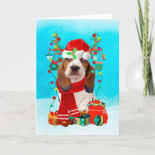 Basset Hound in snow with Christmas gifts Card