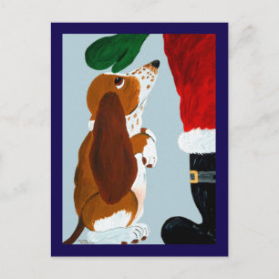 Basset Puppy getting a pet from Santa Postcard