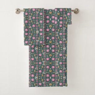 Bathroom towel set displayed against a wall