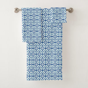 Bathroom towels featuring a blue geometric pattern