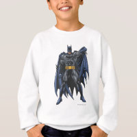 Batman holds up cape