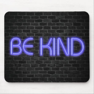 BE KIND text in neon lights on brick Mouse Pad
