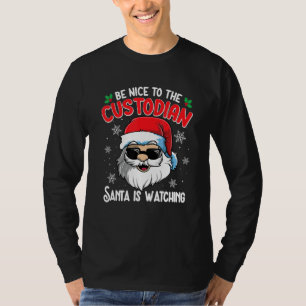 Be Nice To The Custodian Santa Is Watching  Christ T-Shirt