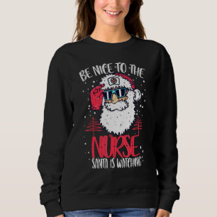 Be Nice To The Nurse Santa Is Watching Nurse Chris Sweatshirt