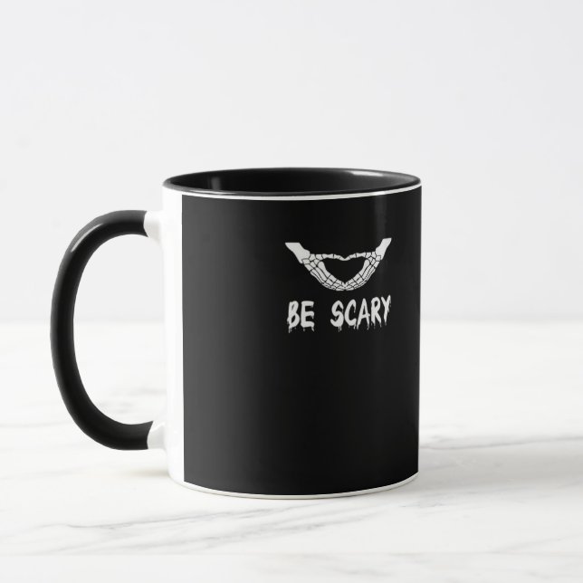 Be Scary Halloween Skeleton Over Heart Mug (Left)