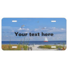 Beach and Ocean View with Sailboat