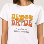 Beach Bachelorette Party Retro Groovy Beach Bride T-Shirt<br><div class="desc">Make a splash at your upcoming bachelorette party with this stunning beach bachelorette party personalised t-shirts. Whether you're celebrating a bach trip, a girls' vacation, or a best friends' holiday, this custom beach bachelorette party t-shirts are the perfect addition to your unforgettable getaway. Add a personal touch to your bachelorette...</div>