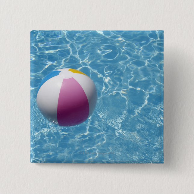 Beach ball in swimming pool 15 cm square badge (Front)