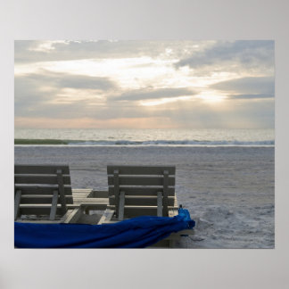 Beach chairs on St. Pete's beach at sunset. Poster