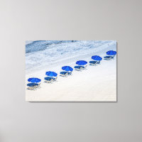 Beach Chairs with Blue Umbrellas on Madeira Beach