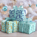 Beach Christmas Glitter Seahorse Pattern Aqua Blue Wrapping Paper Sheet<br><div class="desc">This set of 3 coastal themed wrapping paper sheets features a festive ocean beach Christmas pattern of seahorses, seashells, and holly sprigs, in gold, aqua, and navy glitter, on a light aqua blue background. If you would like this design on more products or other colorways, or for other design-related enquiries,...</div>