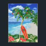 Beach Christmas Holiday Postcard<br><div class="desc">Happy Holidays from the warm sandy beaches of your favourite tropical island beach. Palm tree decorated with Christmas ornaments and lights,  with a retro surfboard leaning against the Christmas tree.</div>