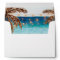 beach design with palm trees lined envelopes
