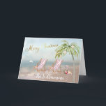 Beach Flamingo Wreath Unique Christmas Card<br><div class="desc">Merry Christmas on this lovely Watercolor Beach -- peaceful and gentle scene with two beach chairs -- friendly flamingo with lovely wreath -- Palm tree with a few ornaments. Also available in different paper weights -- your selection. Any design questions, just send an email to charmdesignstudio@rcn.com and we'll be delighted...</div>