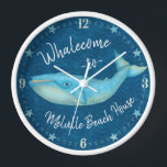 Beach House Blue Whale Nautical Whalecome | Custom Clock<br><div class="desc">You won't find a more strikingly beautiful, personalised beach house design than this "Whalecome" one with an original drawing of a blue whale. The gorgeous whale is made in shades of teal and golden beige on a darker, navy blue background. Celebrate the seaside with this one-of-a-kind artwork. Use the template...</div>