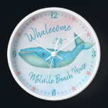 Beach House Blue Whale Nautical Whalecome | Name Clock<br><div class="desc">You won't find a more strikingly beautiful, personalised beach house design than this "Whalecome" one with an original drawing of a blue whale on a light watercolor background. The gorgeous whale is made in shades of teal and golden beige. The background has light hints of blues and pinks. Celebrate the...</div>