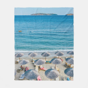 Beach lounge on seashore facing the sea fleece blanket