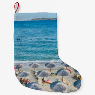 Beach lounge on seashore facing the sea small christmas stocking