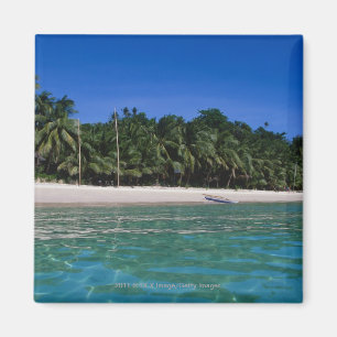 Beach, raft in a distance magnet