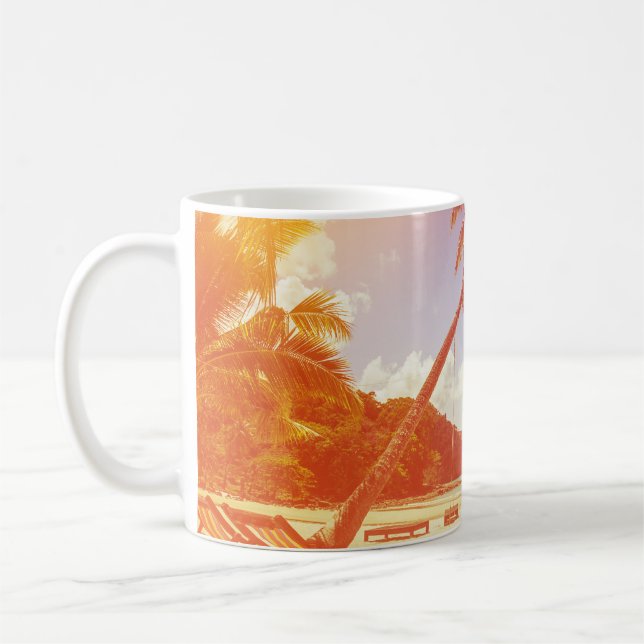 Beach scene, coconut tree, wooden bed. coffee mug (Left)