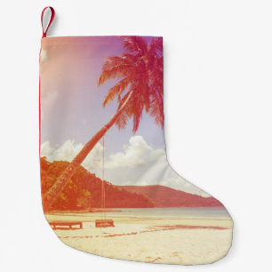 Beach scene, coconut tree, wooden bed. small christmas stocking