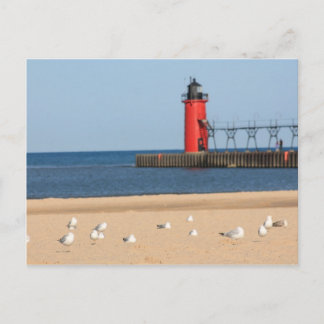 Beach scene with seagulls and lighthouse postcard