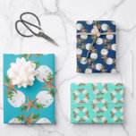 Beach Wreath Sea Stars Sand Dollars Blue Wrapping Paper Sheet<br><div class="desc">Set of three wrapping paper sheets with beach Christmas patterns.  White sand dollars and brown sea stars make a wreath shape which forms a pattern in varying sizes over paper in shades of blue.  Aqua,  turquoise and navy blue colours come rolled so the paper will not be creased.</div>