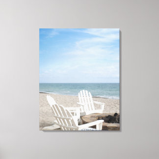 beachfront house with adirondack chairs and canvas print