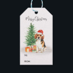Beagle Dog Cute Santa Festive Christmas Gift Tags<br><div class="desc">Add the finishing touch to your holiday cards, gifts wrapping or party this holiday season with this elegant Christmas beagle in a santa hat design christmas gift tags, and matching decor. This beagle gift tags features a watercolor beagle santa dog with tree. This beagle gift tags will be a favourite...</div>