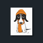 Beanie Dog | Cute Piebald Dachshund  Canvas Print<br><div class="desc">Cartoon style drawing of a black,  tan and white Piebald Dachshund wearing an orange beanie and scarf. A fun canvas print for anyone who loves wiener dogs. Visit Jenn's Doodle World for even more cute animal art and dog lover's illustrations.</div>
